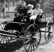 Catherine, Tan, and Florence McKirdy in their horse drawn buggy
