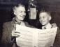 Kate and a young boy radio broadcasting