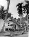 Kate takes a picture of a house in Singapore in 1958.