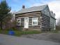 Log House with modern addition at back