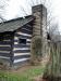 Squared Log Cabin with Brick Chimney