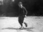 Boy playing with a Hoop and Stick