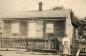 Ellen Barnard Smith in front of her house