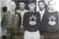 Dr. James Naismith poses with the Canadian National Basketball team in Berlin. 