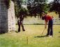 Twin sisters Shariffa and Natalie play croquet on the Camelon farm, formerly the Young Farm.