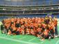 The 2003 National Capital Bowl Champions, ADHS Thunderbolts pose with the cup.