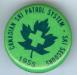 This button was sold for fundraising in 1955 for the Canadian Ski Patrol System CSPS.