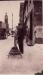 Marlow Banks' father Charles, demonstrating his bicycle stand in front of his store.