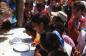Residents participating in a pie eating contest on Canada Day at the Scarborough Historical Museum..