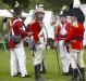 Reenactors discussing strategy in front of the British camp.