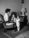 The wife and children of an Inco employee pray for their father to return safely from the war