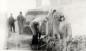 Fireman shovelling coal ashes out of Kiln 1930's