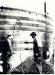 Adolph Ropertz (l) and Paul Brunner (r) firing forced draft kiln 1936
