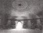 Interior view of the kiln showing the high aprons for the coal fireboxes lining the walls.