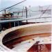 Rebuilding dome on Kiln 3, 1980. 