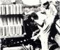 Transfering a load of large bricks into a kiln, 1937