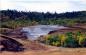 Terraced Clay Pit 4 shows open pit mining process at the base of the Dirt Hills south of the Plant.