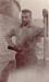 Unknown Fireman, Karl Harlos?? posing beside one of the Kilns
