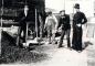 Fireman with visitors and off duty employees outside a Kiln