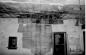 Deteriorating condition of the Bunkhouse ceiling and walls in the Dining room area.