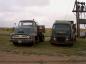 L to R: 1954 Ford truck used to run errands and 1943 White (cab over model) used to haul clay