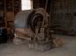 The Ball Mill was used to pulverize clay into a talc like powder and then bagged for sale.