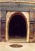 Parabolic arched Kiln doorway with steel strapping that encircles the structure.