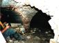 Restoration employee Jason Prefontaine in Waste Heat Tunnels