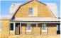 Purdy farm house located 5 miles north of Claybank faced built of Ruff Tex brick