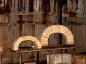 The Kiln ceiling are constructed with wedged bricks and are held up by gravatational pressure.