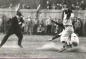 Umpire looks on at close play during an H&D League game involving the Kentville Wildcats