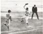 Dartmouth Arrows first baseman steps on the bag to get runner out as umpire watches to make the call