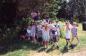 A group of children on the MacDonald House Museum site for a nature walk on the 'Bunny Trail'.