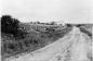 The road at East Lake Ainslie, Nova Scotia, at the turn of the century. 