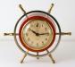 A ship's wheel alarm clock, Snider Clock Corporation (windup movement).