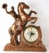 Large, coppertone-finish cowboy mantel clock, Snider Clock Corporation (electric).