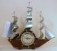 Electric three-masted boat clock, chromed metal sails, no lights, Snider Clock Corporation.