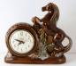 Brown china horse TV lamp electric clock, Snider Clock Corporation.