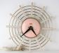 Pink version "popsickle stick" electric wall clock, Snider Clock Mfg Co.