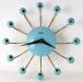 Turquoise version of the Snider Spider electric wall clock, Snider Clock Mfg Co.