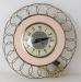 Round "basket" electric wall clock, Snider Clock Mfg Co.