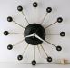 Model 100 variation on the "atomic" electric wall clock, Snider Clock Mfg Co.
