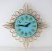 A colourful electric wall clock, Snider Clock Mfg Co.