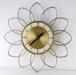 Open flower petals electric wall clock, Snider Clock Mfg Co.