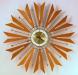 A spectacular starburst electric wall clock, Snider Clock Mfg Co.