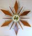 Alternating cones and diamonds, large starburst electric wall clock, Snider Clock Mfg Co.