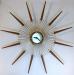 Simple design but large sunburst electric wall clock, Snider Clock Mfg Co.