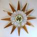 Another star-shaped starburst electric wall clock, Snider Clock Mfg Co.