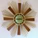 A variation on the wood rays with multi rods starburst electric clock, Snider Clock Mfg Co.