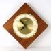 The diamond-shaped version of a plain electric wall clock, Snider Clock Mfg Co.